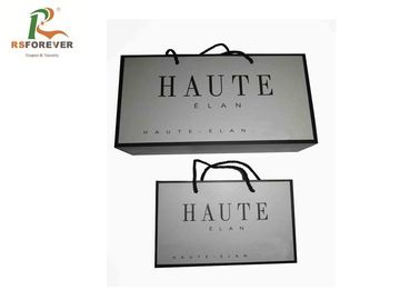 China Luxury Paper Shopping Custom Printed Bags For Clothing Packaging Rope Handle factory